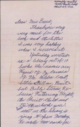 Letter on lined paper written in cursive handwriting and blue ink with date and return address in the top right corner.