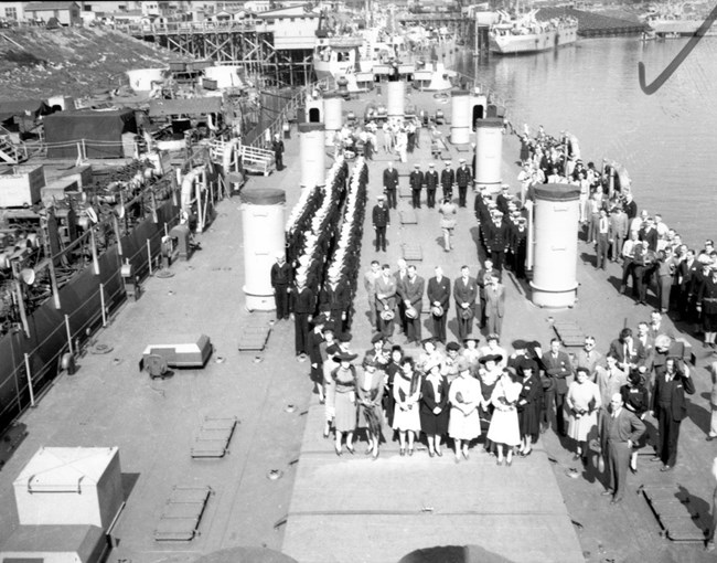 LST Shipyard, Evansville. Courtesy of University of Southern Indiana. Black and white overhead photo of crowd along a dock