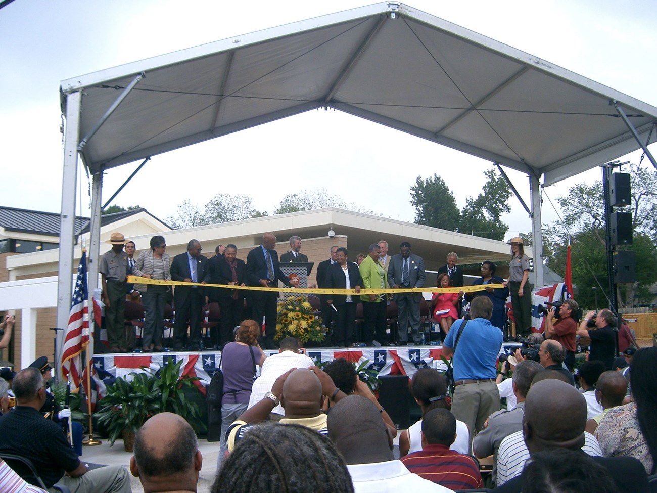 Members of the Little Rock Nine prepare to cut the ribbon during the dedication ceremony, September 24, 2007.