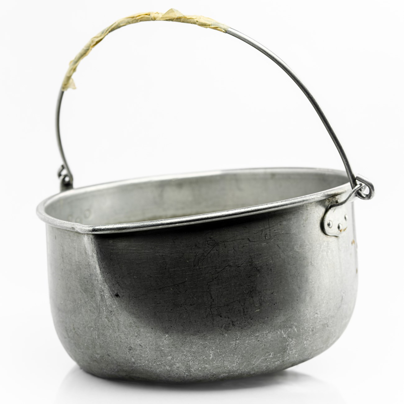 Metal pot with small spout and thin metal handle
