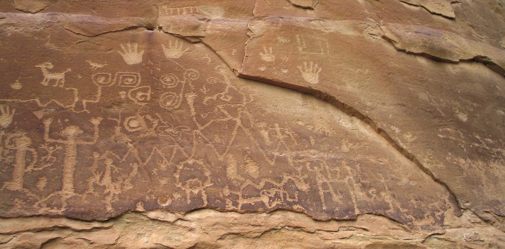 Petroglyphs carved on a rock face