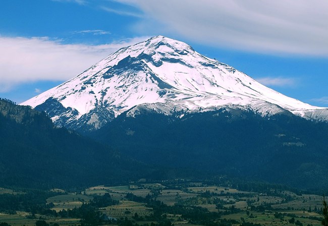 large mountain covered with snow.