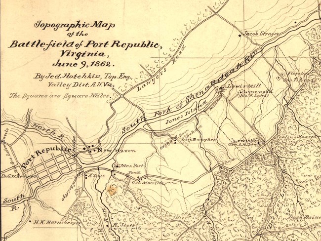 Hand-drawn map of battlefield with grid lines of town of Port Republic and squiggly line of south fork of Shenandoah River crossing diagonally from left to right.