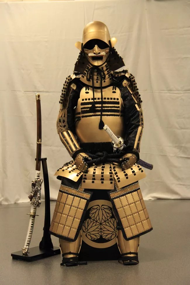 Traditional samurai armor (reproduction) with two katanas.