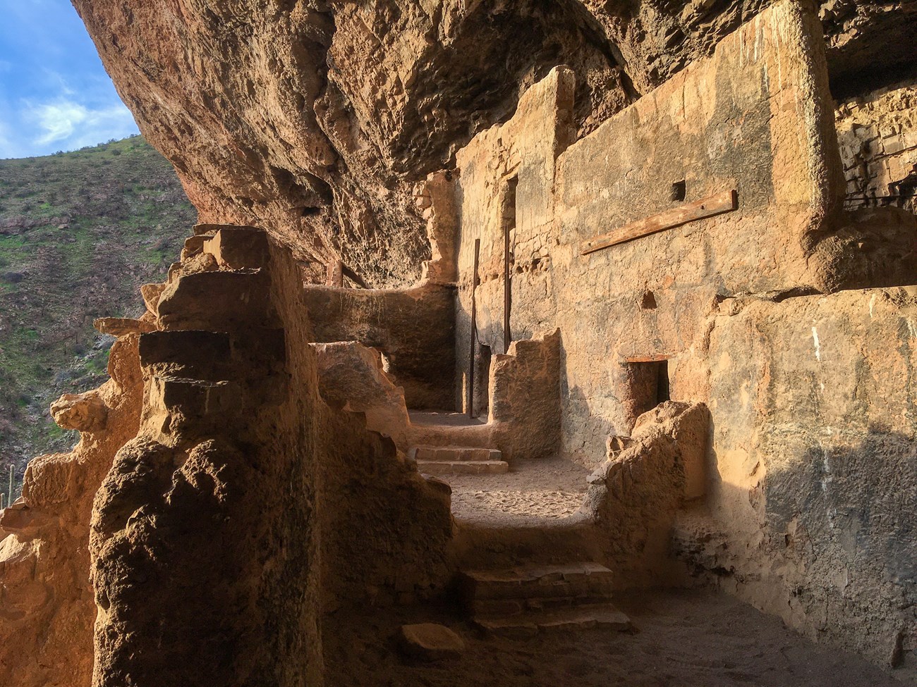 The historic walls and cave opening of the lower cliff dwellings at Tonto National Monument.