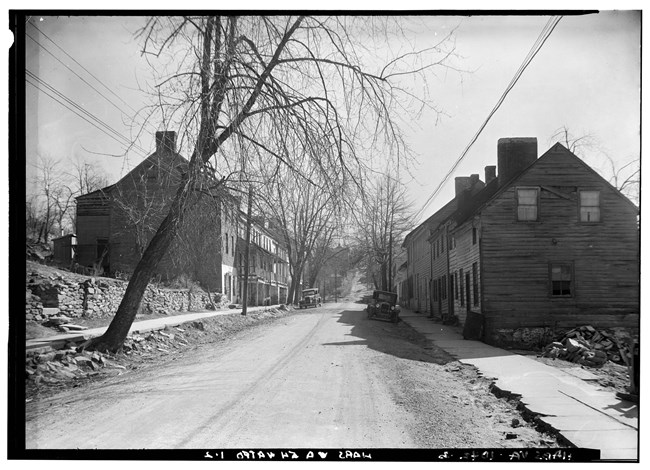 black and white image from 1937 showing houses along Waterford's Main Street