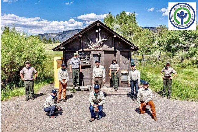 Youth Conservation Corps crewmembers posing for a group photo at Yellowstone National Park