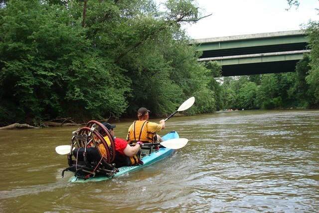 River Rally participants paddle with a wheelchair down the Saluda. Photo courtesy of Matt Schell, Anderson County’s Department of Parks, Recreation and Tourism.