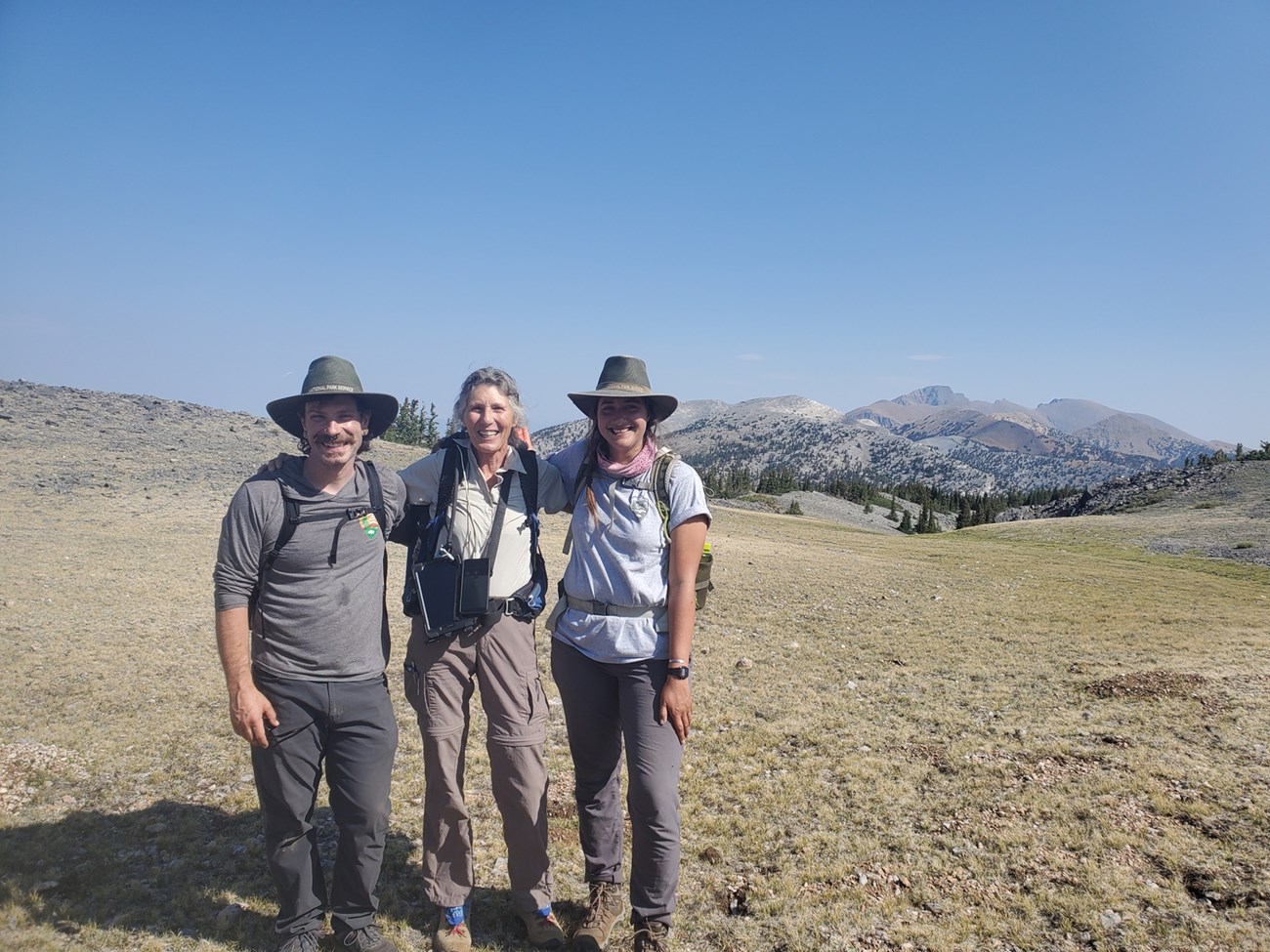Three researchers who are part of the alpine plant survey crew.
