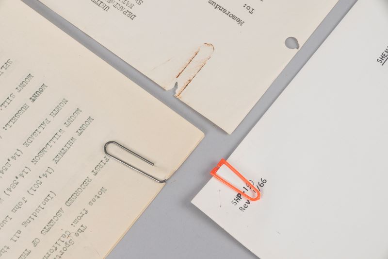 Metal and plastic paperclips.
