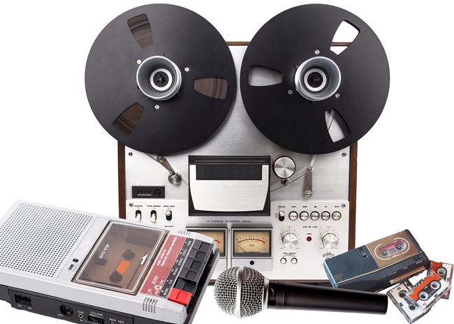Recording equipment reel-to-reel and audiocassette records and a microphone