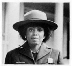 Portrait of Diane Dayson wearing the NPS uniform with badge and ranger flat hat.