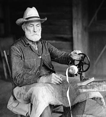 Man peeling apples