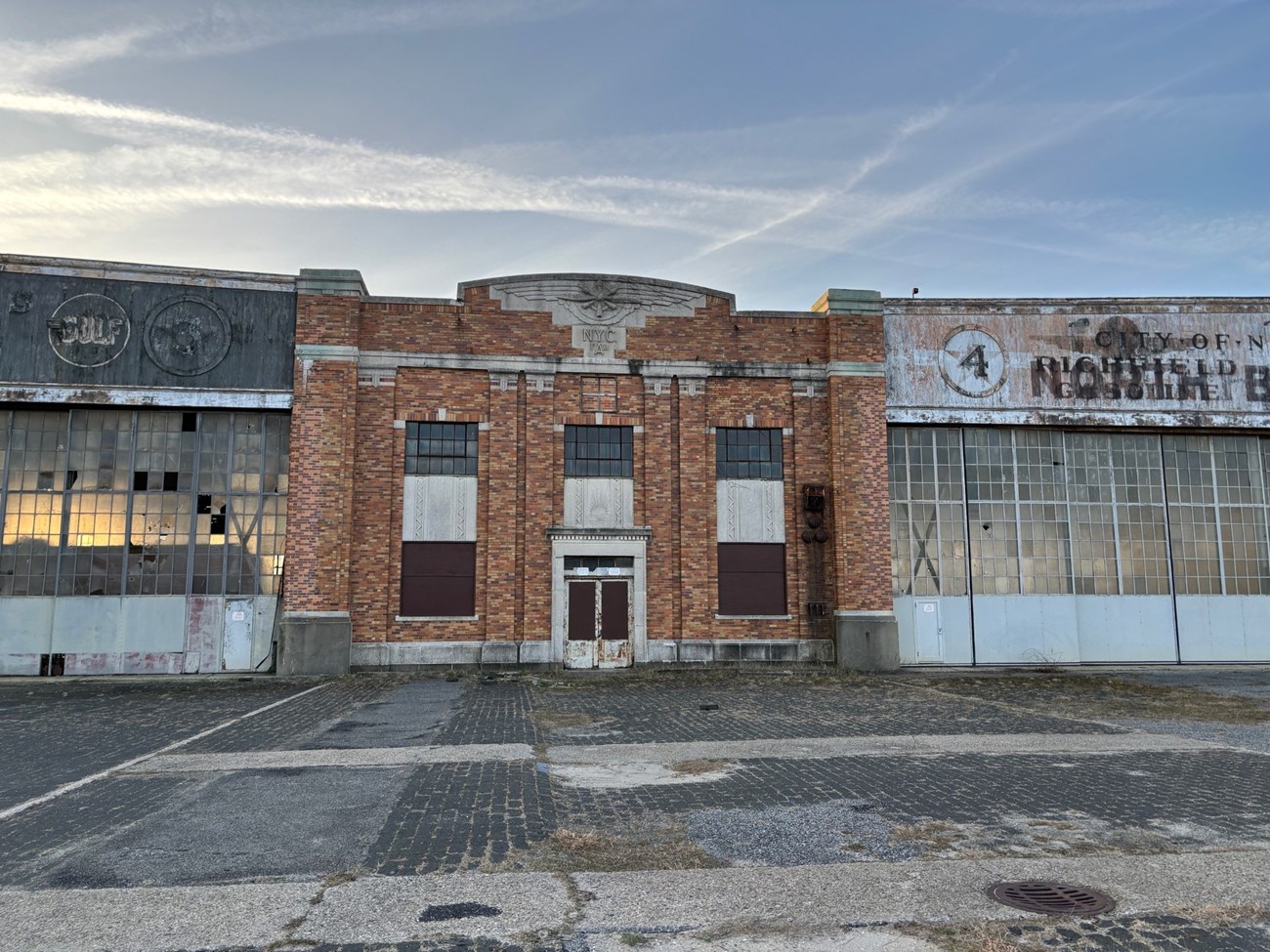 Two historic aircraft hangars in a state of disrepair