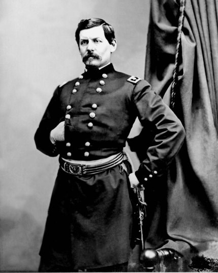 man in uniform standing with his left hand inside his jacket