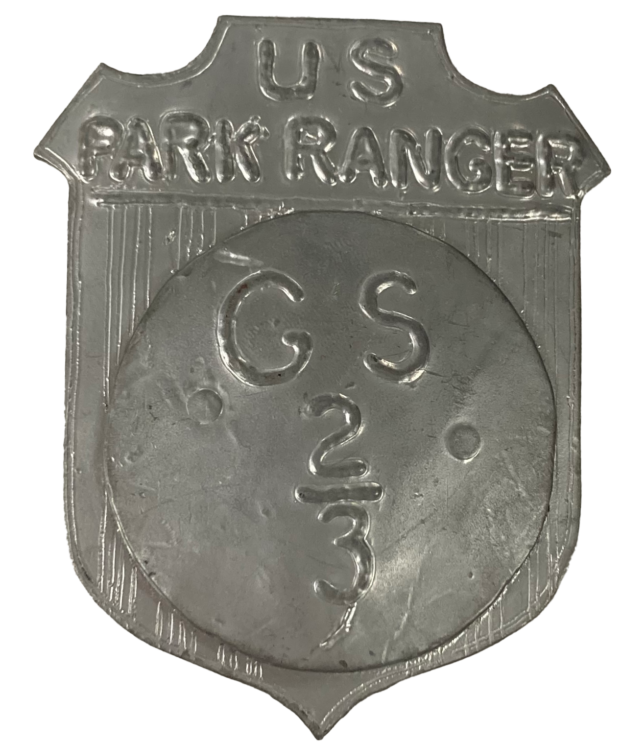 Silver shield shaped park ranger badge marked GS2/3