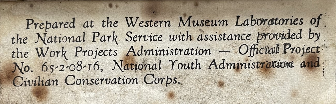 Paper label documenting preparation by NPS Western Museum Laboratories