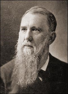 black and white photo of a man with a long white beard