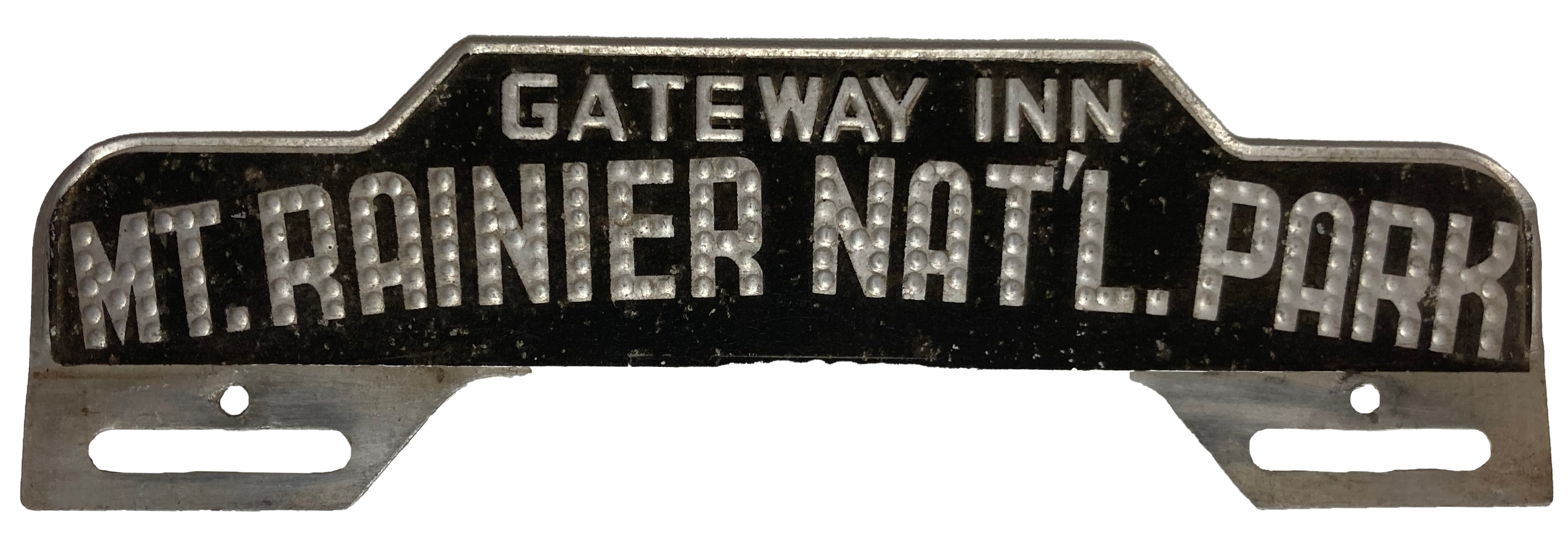 Metal plate marked for Gateway Inn Mount Rainier National Park