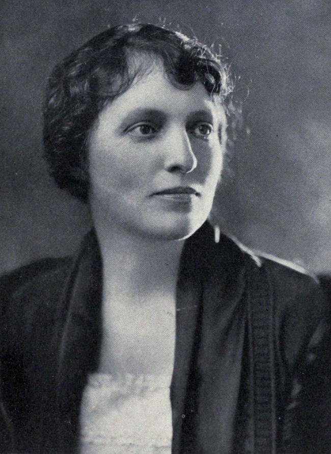 Portrait of Mary A. Rolfe looking to the side, away from the camera.