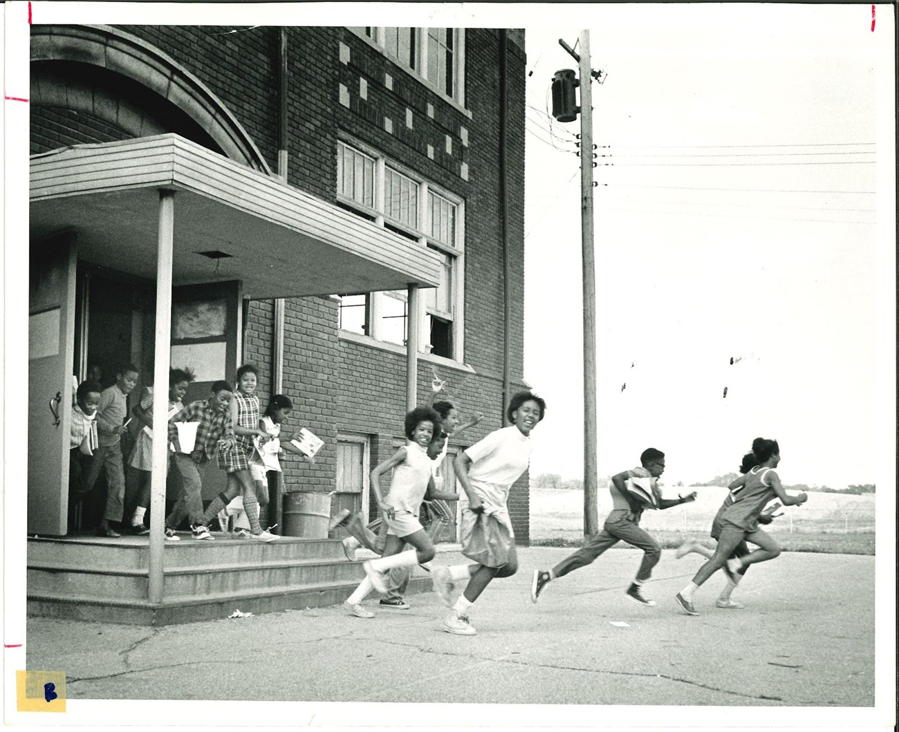 Students running out of Clark Elementary, circa 1971