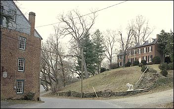 Photo of a brick house on a hill. (Bronwen Souders)