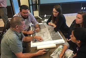 Group of architects gathered at a table