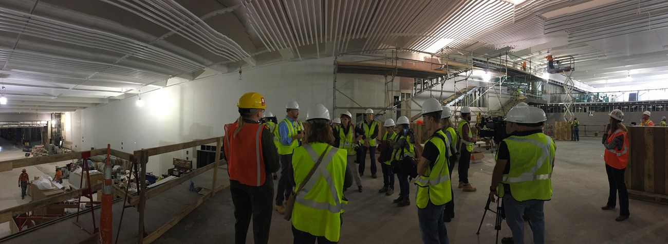 The above photo shows a group of local media in St. Louis receiving a construction tour of the new museum and visitor center.