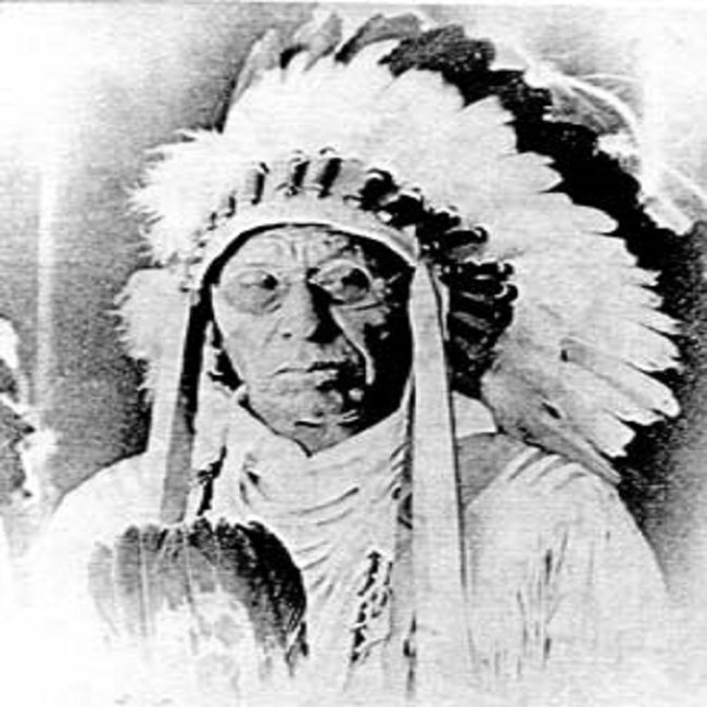 Chief Four Dance Portrait of Chief Four Dance in full headress