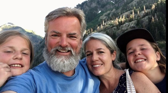 Emmeline Morris and her husband and two children hiking