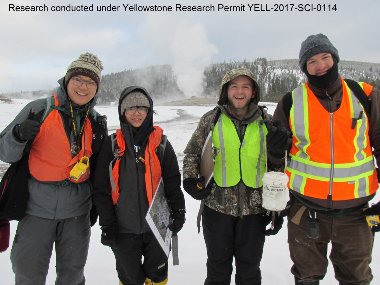 Geologists from University of Utah conduct research on Old Faithful geyser. (Left to Right:  Max Jin Hansheng, Sin-Mei Wu, Jonathan Voyles, Jamie Farrell)