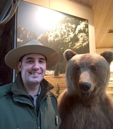 Jason Bordelon and a stuffed bear