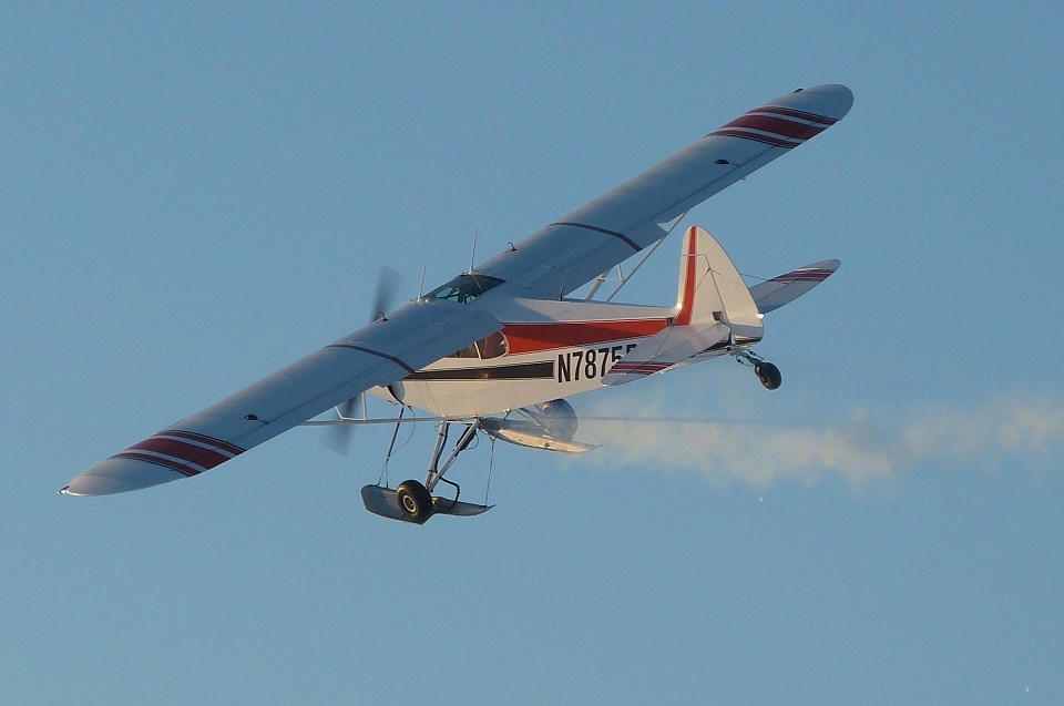 Small airplane in the sky