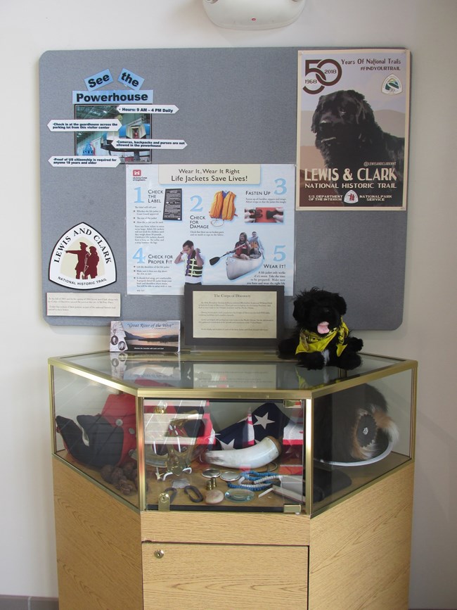 toy dog near Lewis and Clark poster