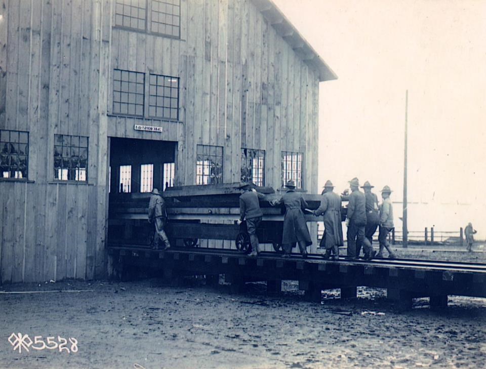 SPD Mill SPD soldiers bringing lumber into mill