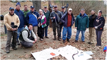 Group of people gathered in the woods