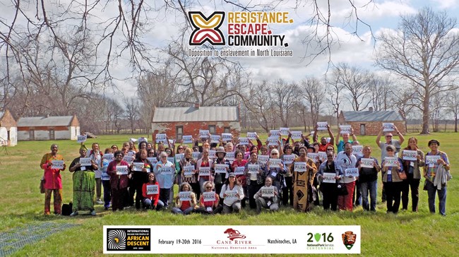 Conference attendees gather for a photo in the Cane River National Heritage area.