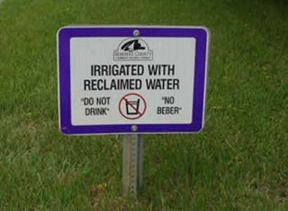 reclaimed water sign on grass