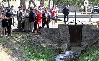 Group gathered the sluice gate