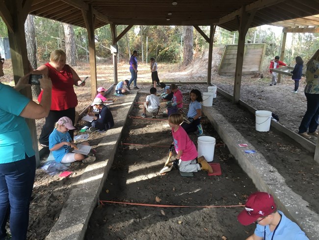 students digging at fort frederica nps photo