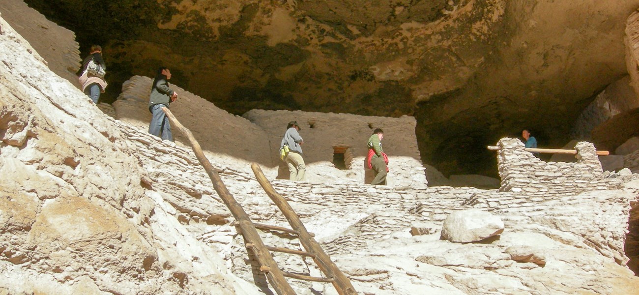 gri-photo-gicl Visitors explore Gila Cliff Dwellings