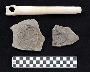 AD 1650-1670 Bellarmine or Bartmann bottle sherds found in submerged context with bone tool. (NPS photo) AD 1650-1670 Bellarmine or Bartmann bottle sherds found in submerged context with bone tool. (NPS photo)