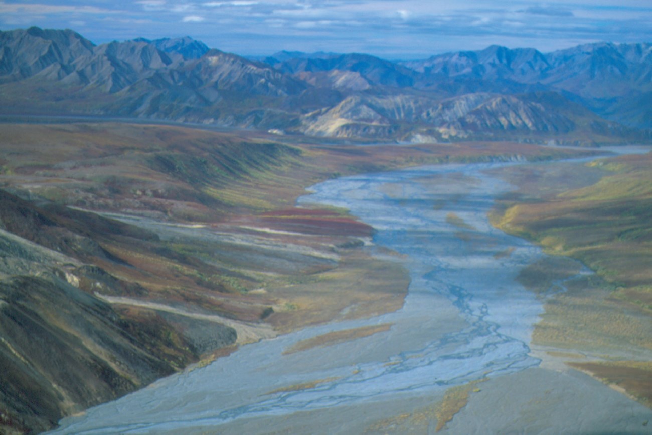 wide river with mountains in the distance