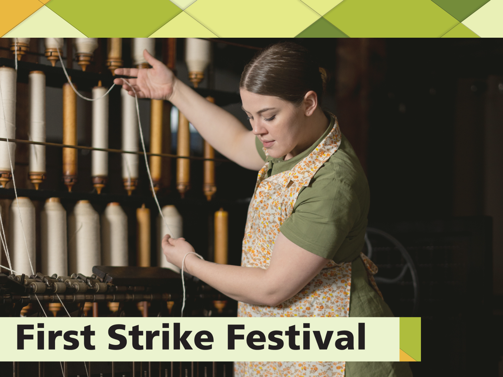 Woman standing in front of machine holding thread