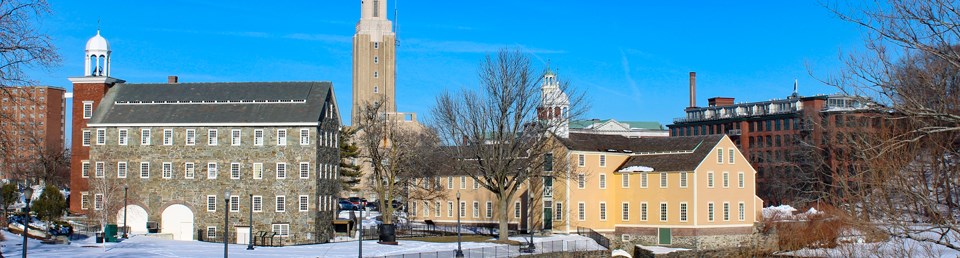 view of Slater Mill in winter time