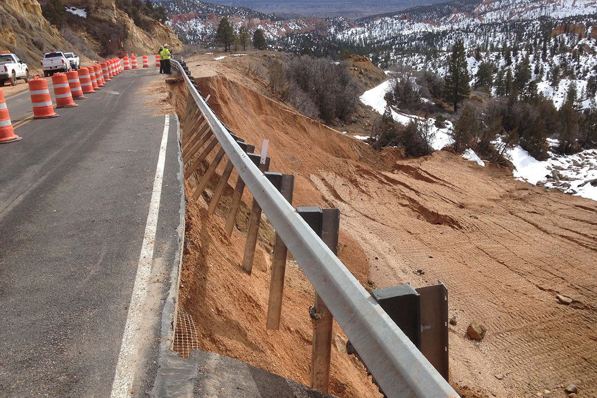 Photo of collapsed road following landslide