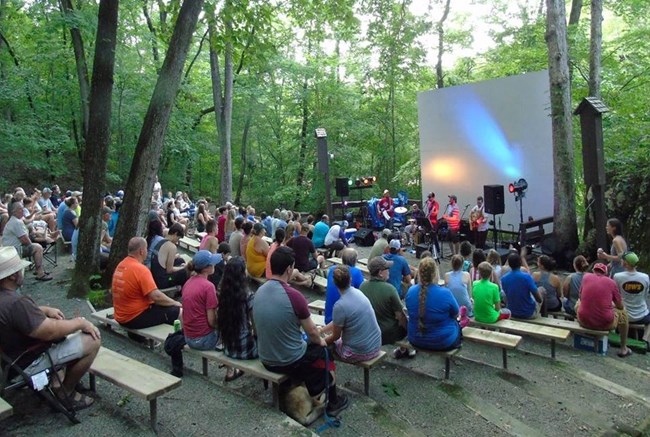 Campers enjoying a band at the Buffalo Point Amphitheater