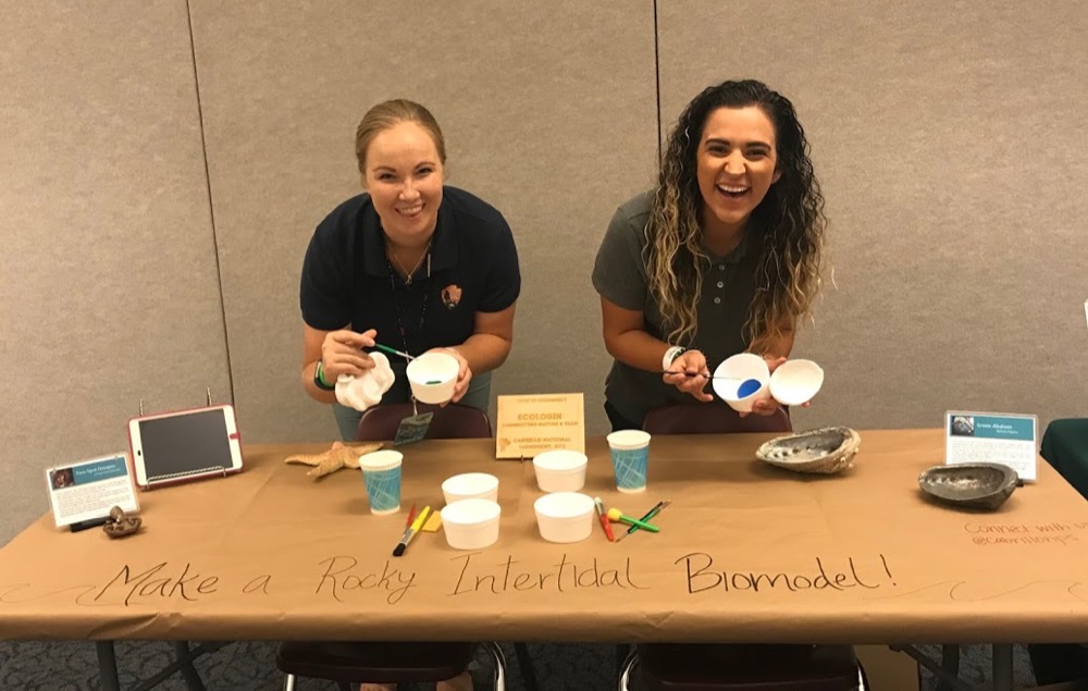 Science educators McKenna (left) and Nicole (right) paint 3D-printed Two Spot Octopuses (Octopus bimaculoides) at the 2017 San Diego Maker Faire.