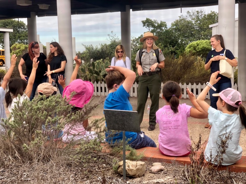 A Park Ranger presenting to a group of fourth-grade students at Cabrillo National Monument.