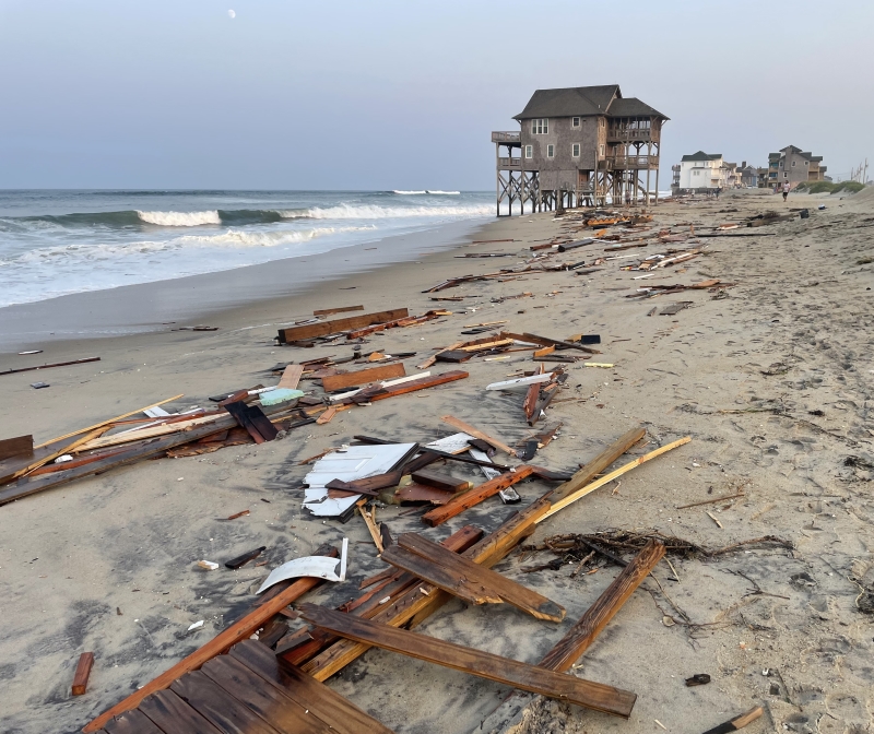 Photo of debris covering a beach.